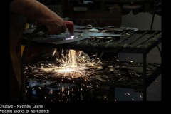 Welding sparks at workbench - Matthew Leane