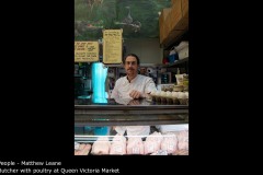 Butcher with poultry at Queen Victoria Market - Matthew Leane